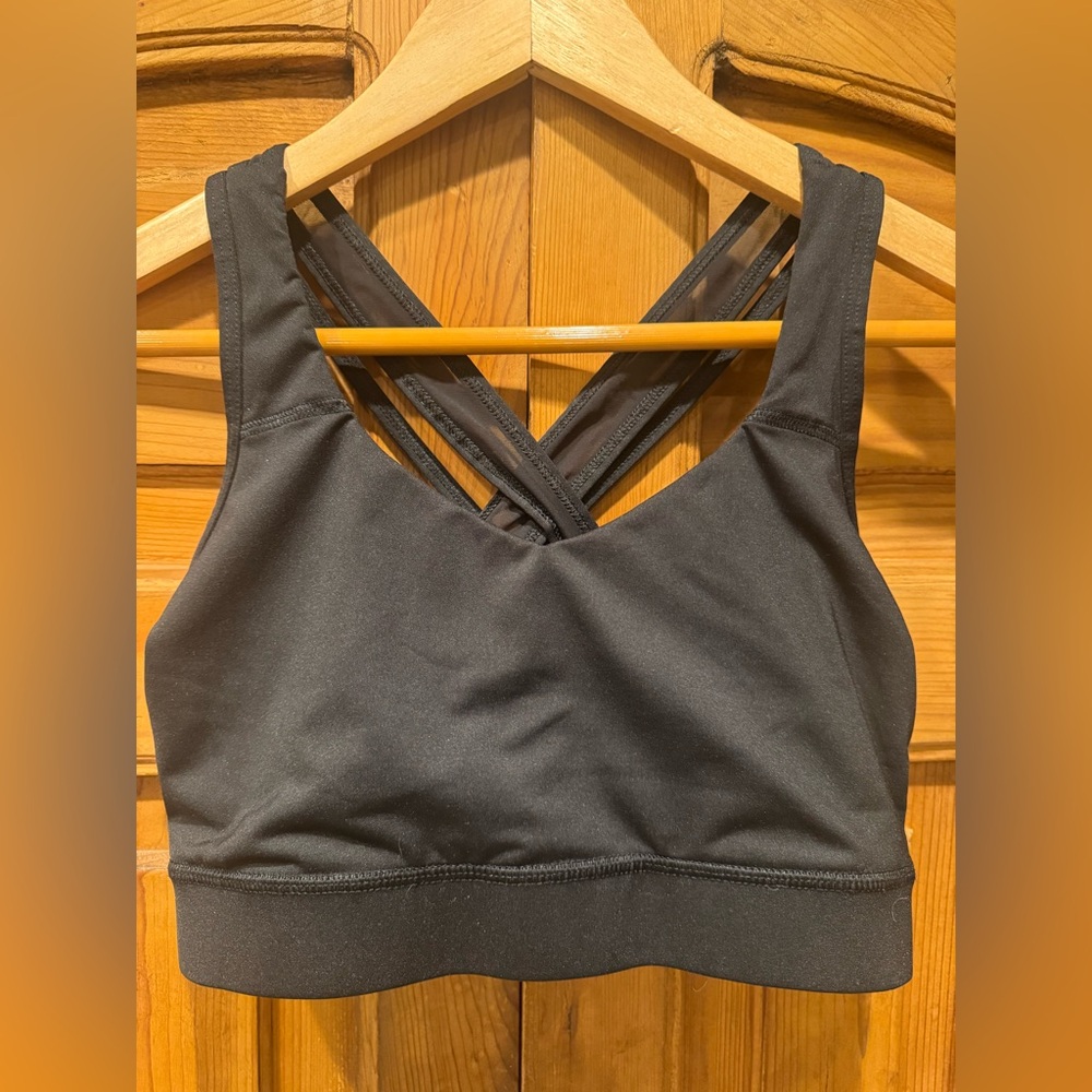 Black Avia Cross-Back Sports Bra with Mesh Detailing.